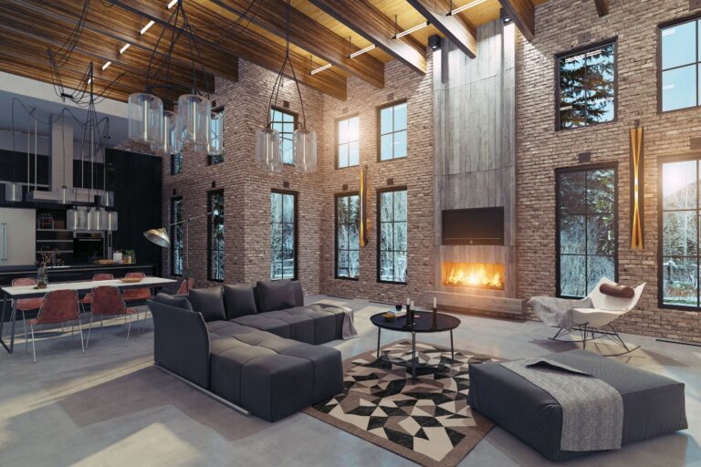 interior of a mountain luxury home with a spacious open floor plan and huge windows with a view