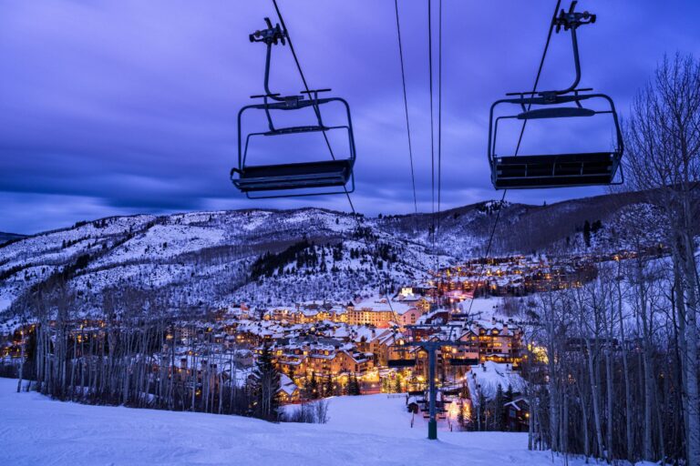 two lifts overlooking Beaver Creek Village at dusk