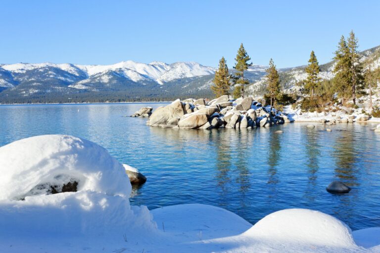 view from the shores of a snowy Lake Tahoe